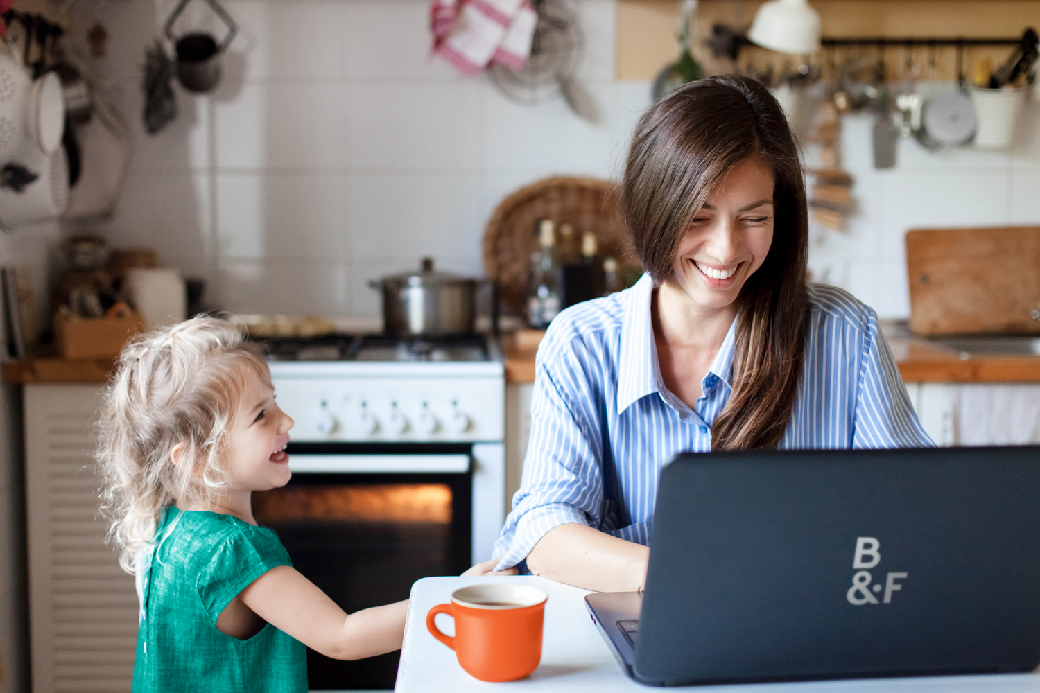 Working mom works from home office.